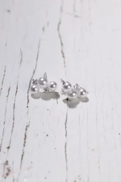 Cailap Hopeakorvakorut helmillä ja kristallikivillä